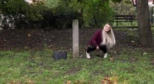 Dirty blonde female can't hold her pee any longer and pisses in public park on modelies.com