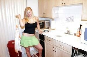 Fuckable blonde amateur Roxy Lovette slowly getting rid of her clothes on modelies.com