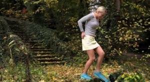 Cute blonde Victoria Pure hikes her skirt to take a pee along country lane on modelies.com