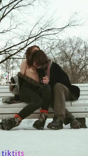 Two underage 18+ TikTok girls have fun in a snowy park and suck each other's virgin nipples nsfw on modelies.com