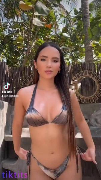 Beautiful TikTok latina dancing in a swimsuit on modelies.com