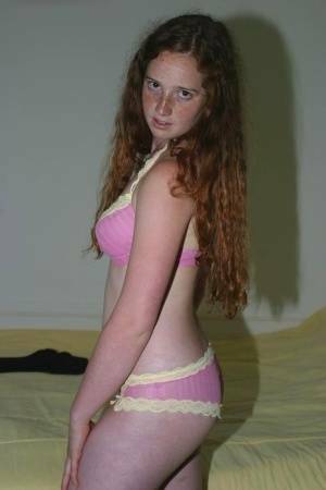 Flexible redhead Rachel showcases her natural pussy after lingerie removal on modelies.com