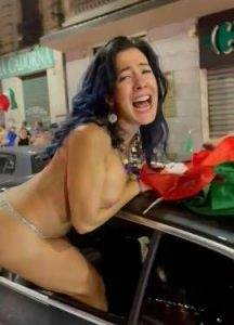 Italian milf nude in public after win - Italy on modelies.com