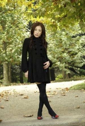 Fully clothed Japanese teen models in the park in black clothes and stockings - Japan on modelies.com