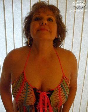 Mature woman Busty Bliss wears see thru attire during POV action on modelies.com