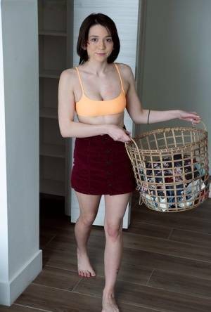 Young brunette Riley Jean makes her nude debut on a bed during laundry day on modelies.com