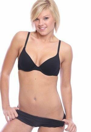 Blonde amateur Tiffany models in her black bra and panty set on modelies.com