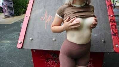 Public flashing in a park with people around on modelies.com