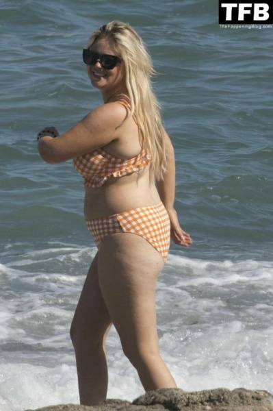Emily Atack is Seen Having Fun by the Sea and Doing a Shoot on Holiday in Spain - Spain on modelies.com
