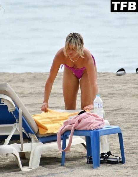 Ashley Roberts Enjoys the Beach on Holiday in Marbella on modelies.com