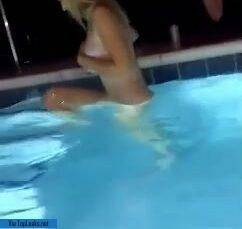 Unhinged teen jumps into pool topless on modelies.com