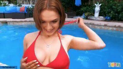 Gracie Gates coyly undoes her top in the pool on modelies.com