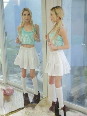 Sweet blonde girl Piper Perri removes her white pretties and skirt on modelies.com